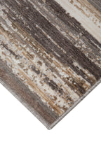 Distressed striped rug with weathered wood texture in brown and cream tones