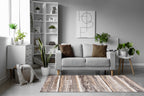 Distressed striped rug with weathered wood texture in brown and cream tones