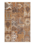 Blue book on tan wool rug with geometric cross pattern and tribal design