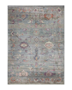 Vintage floral rug with faded botanical pattern in muted blue and rose tones