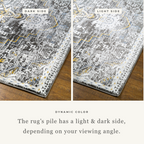 Vintage-style rug with ornate geometric patterns in gray, gold, and black tones
