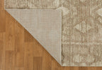 Beige and tan textured rug with subtle diamond pattern throughout