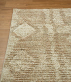 Beige and tan textured rug with subtle diamond pattern throughout