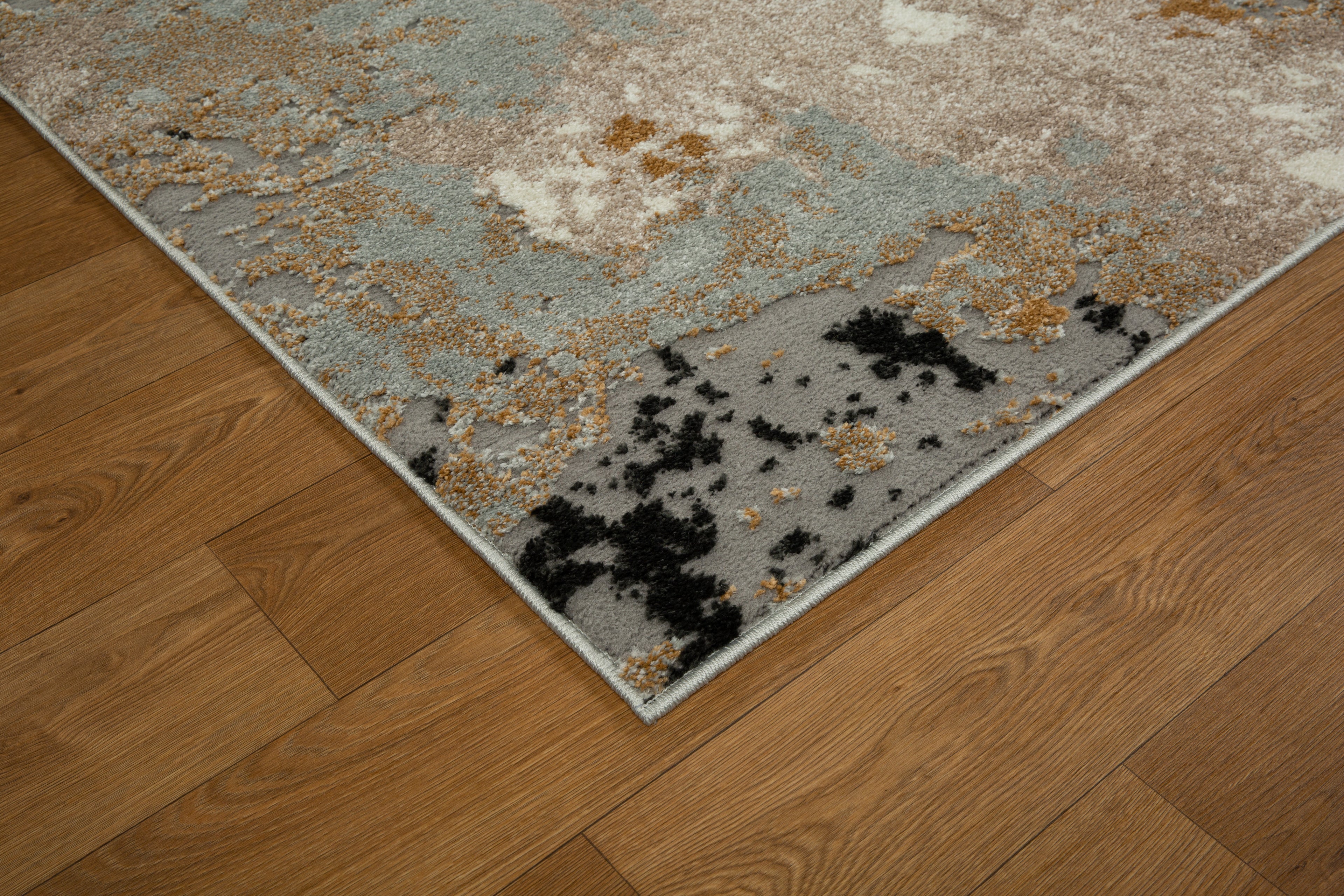 Modern abstract rug with distressed texture in grey, beige, gold and black tones