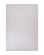 Beige geometric rug with raised diamond pattern and subtle texture throughout