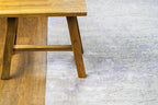 Distressed grey and lavender rug with mottled vintage texture