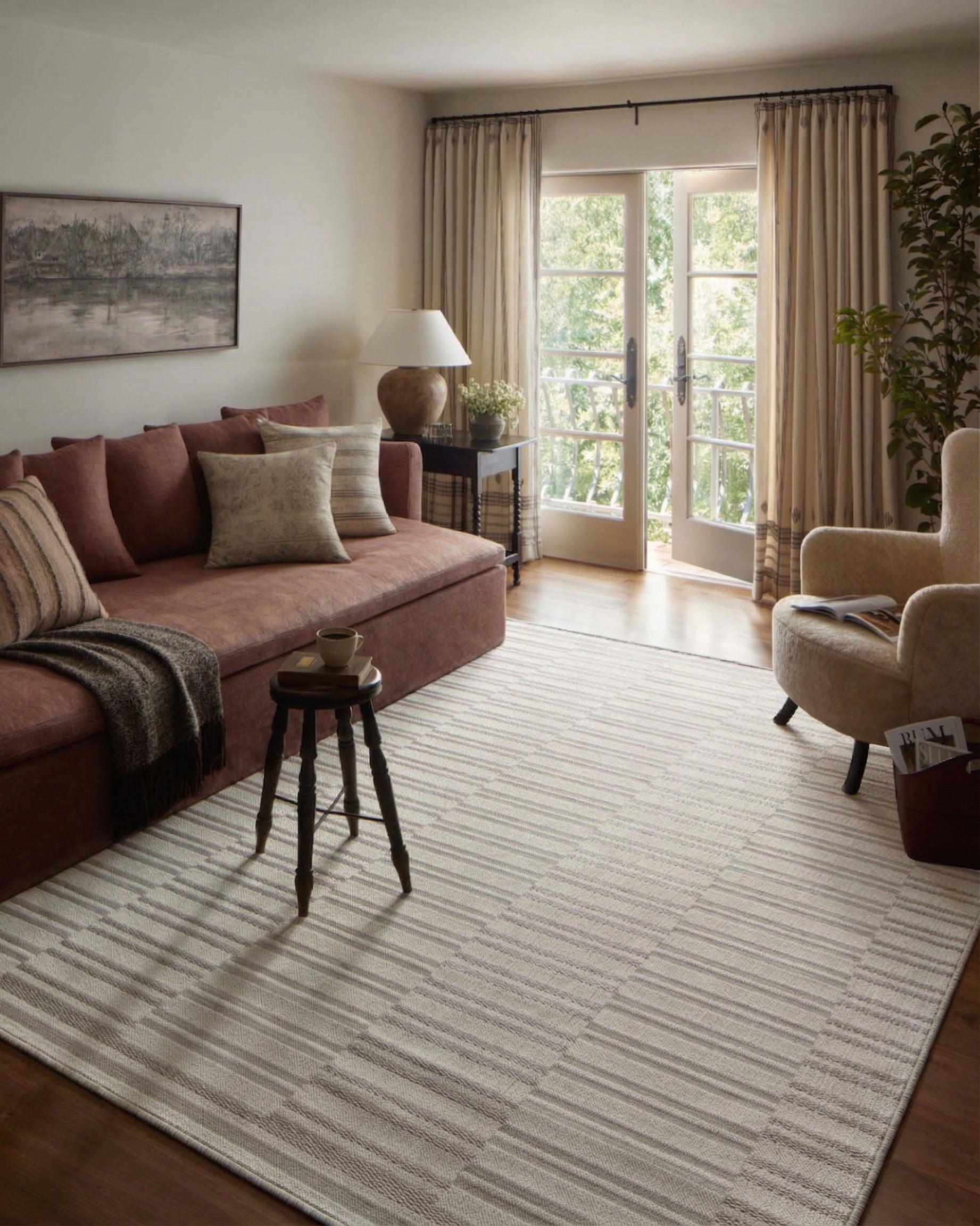 Beige and taupe striped area rug with geometric block pattern design