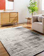 Contemporary grey textured area rug with subtle distressed pattern throughout