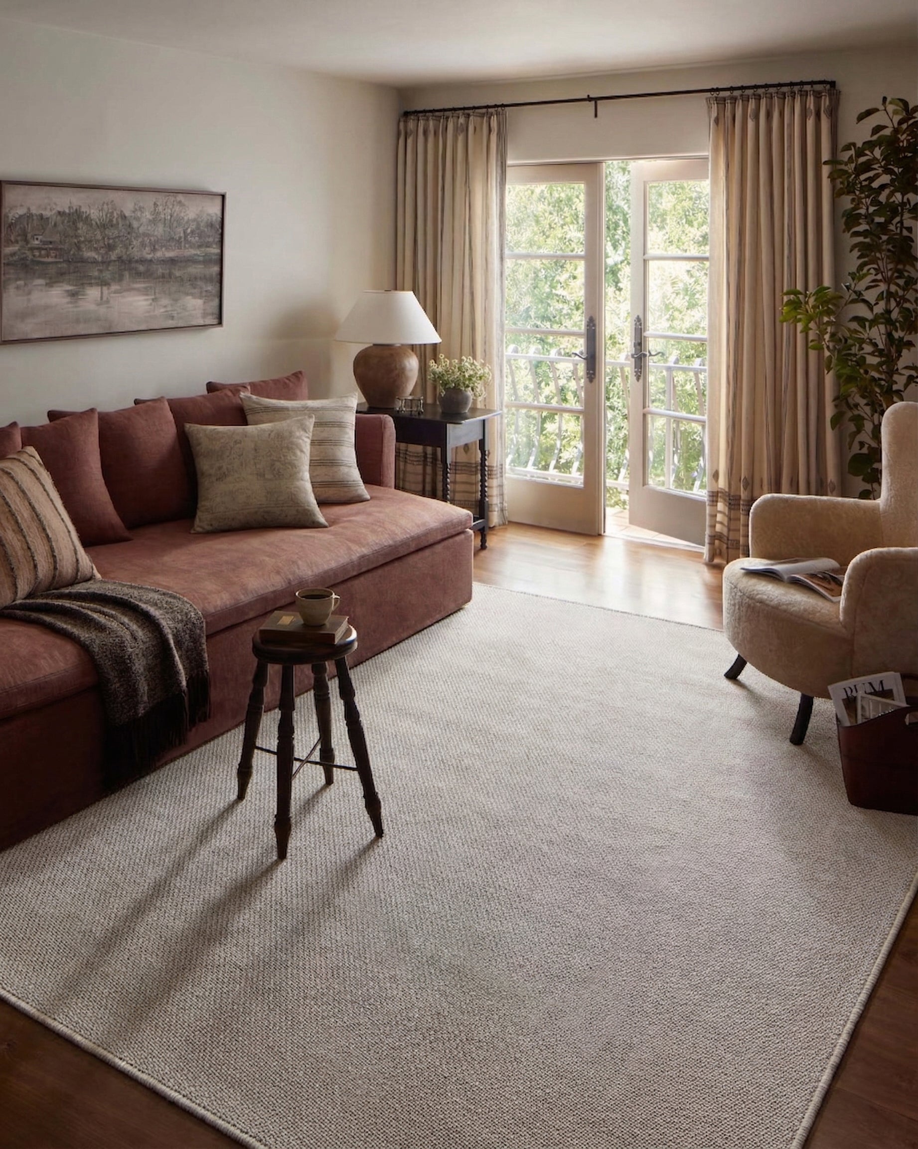 Neutral beige herringbone textured rug with subtle woven pattern throughout
