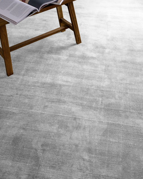 Soft gray wool area rug with subtle texture and natural weave pattern