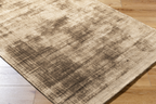 Neutral beige textured rug with distressed abstract pattern and vintage worn finish