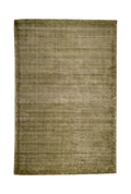Sage green velvet rug with subtle texture and solid mottled pattern