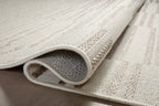 Beige and taupe striped area rug with geometric block pattern design