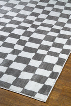 Charcoal and cream checkered wool rug with textured woven pattern