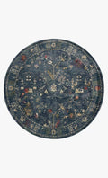 Blue vintage-style rug with floral motifs and ornate border design