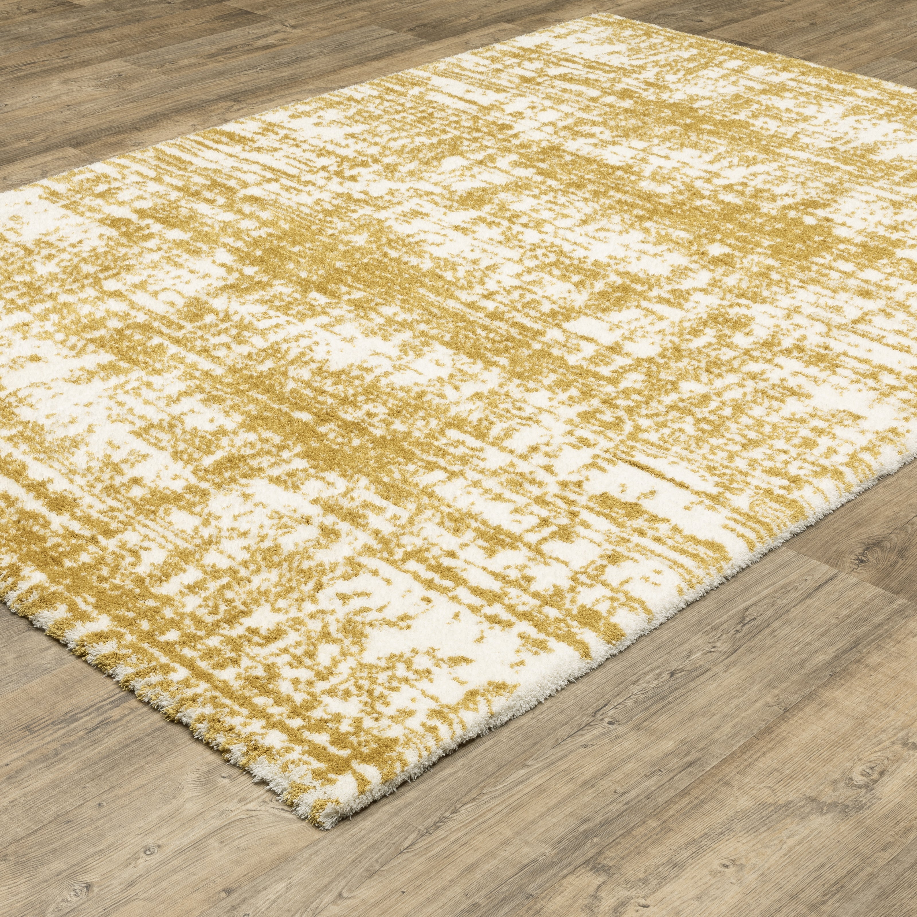 Gold and white distressed texture rug with abstract horizontal pattern