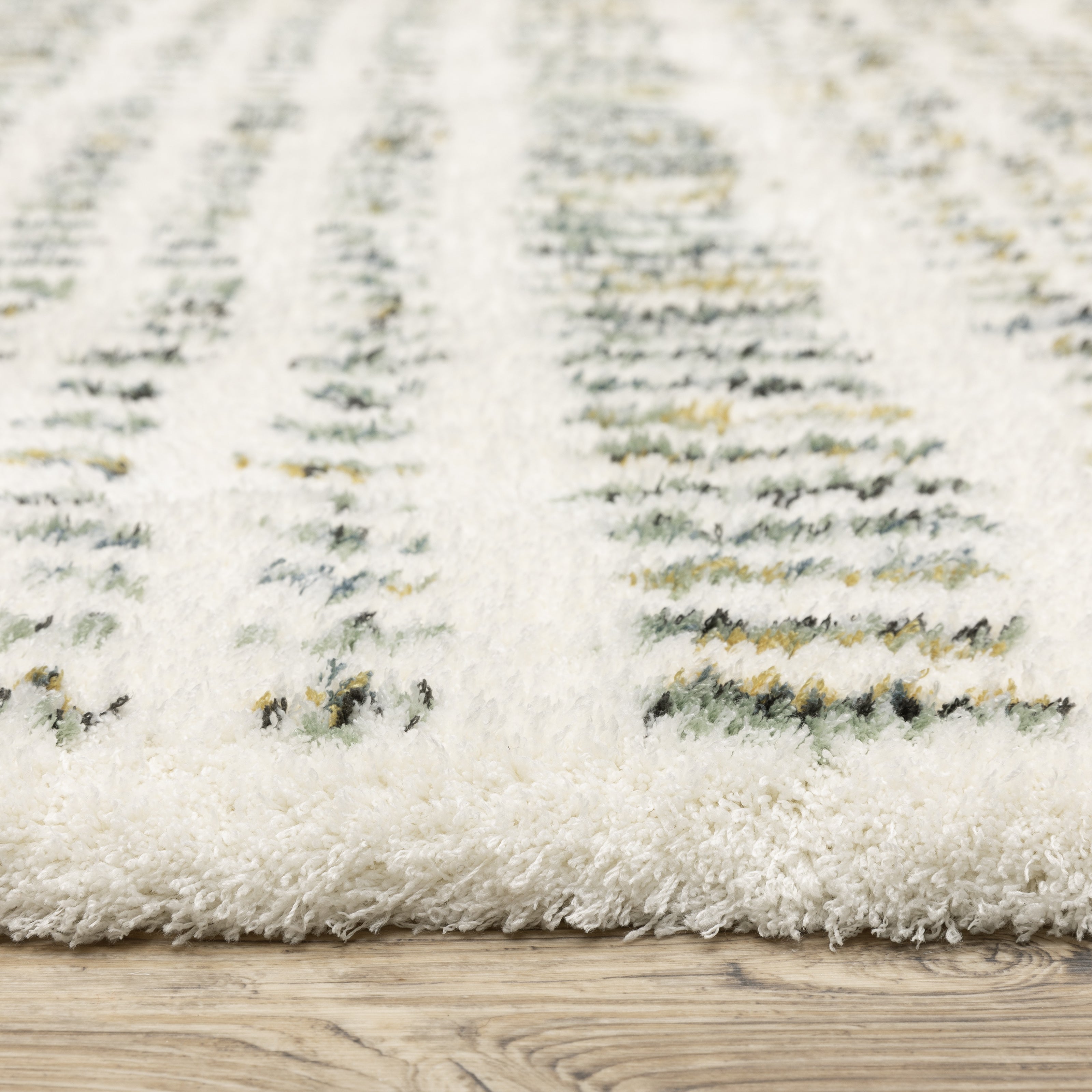 Textured cream and gold flatweave rug with woven geometric pattern design