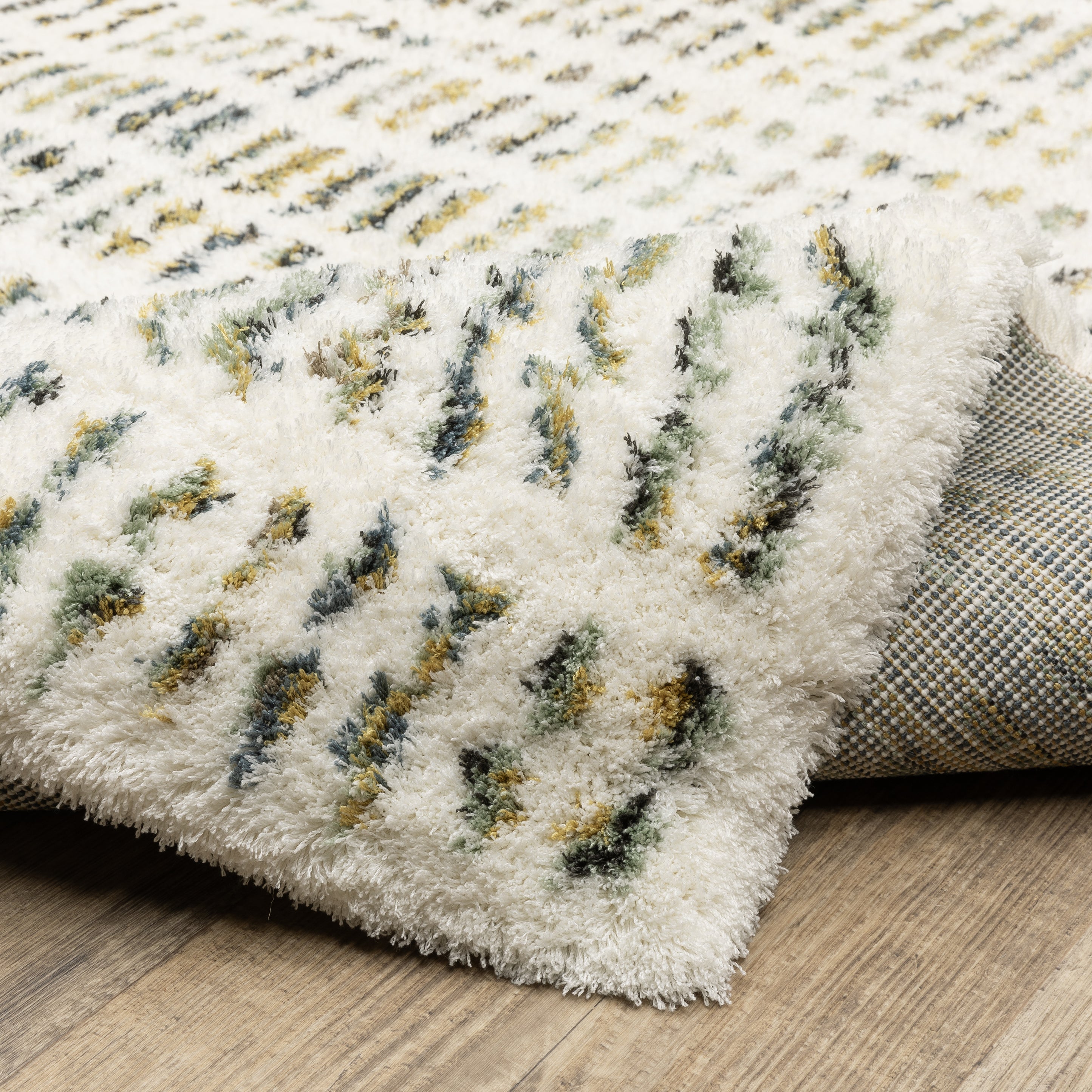 Textured cream and gold flatweave rug with woven geometric pattern design