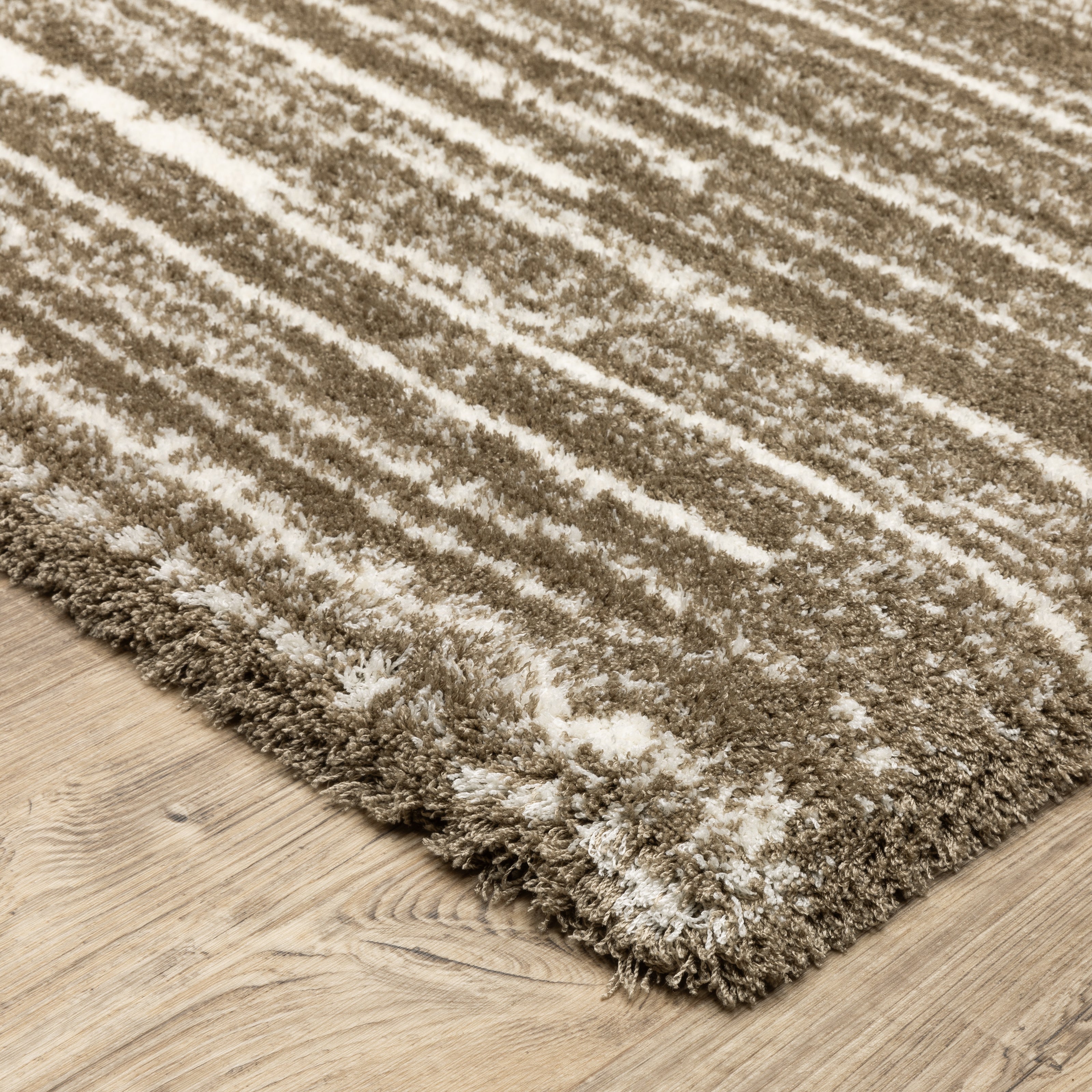 Brown and cream striped texture rug with horizontal woven pattern
