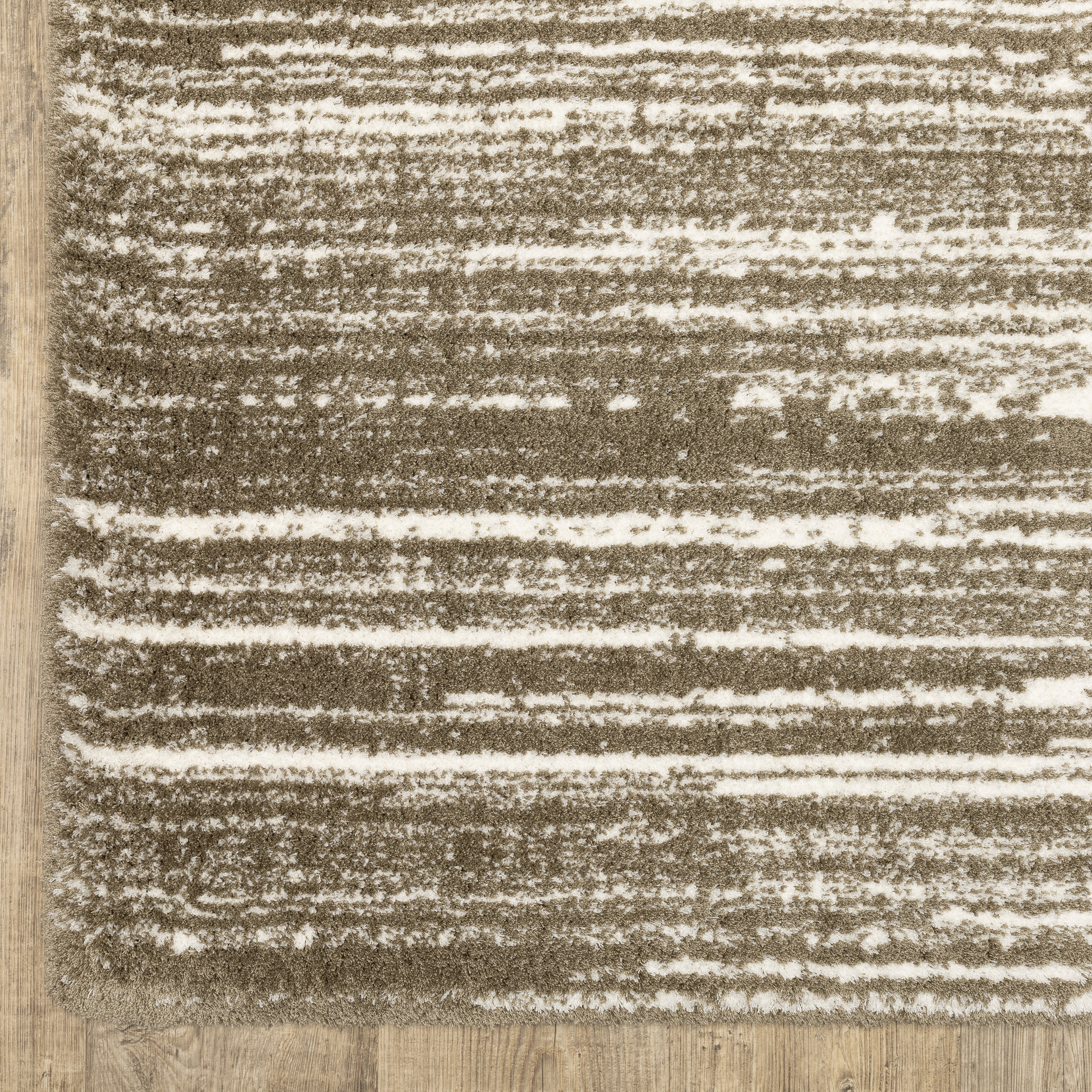 Brown and cream striped texture rug with horizontal woven pattern