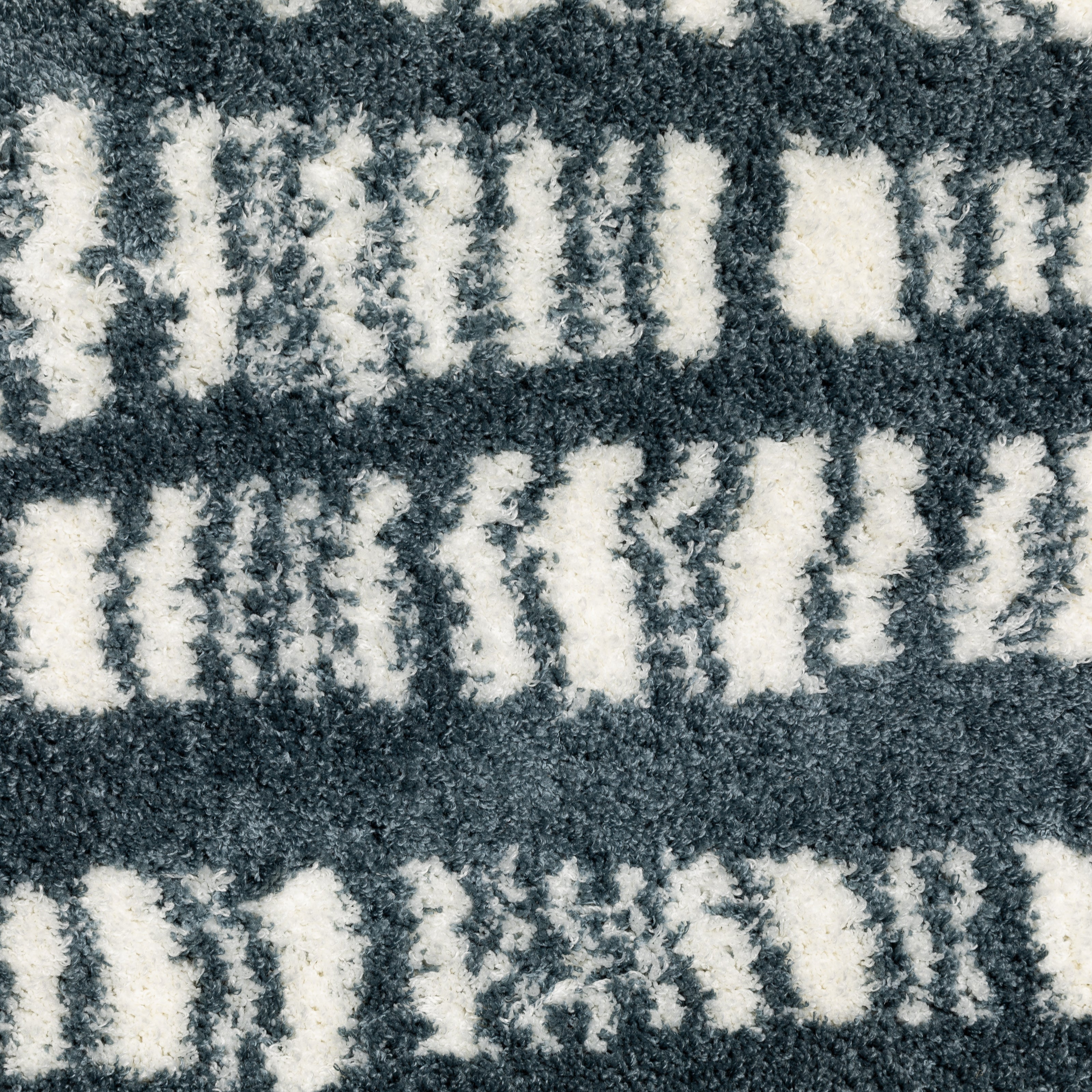 Teal and white striped wool rug with textured horizontal pattern detail
