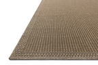 Neutral beige textured woven rug with fine ribbed pattern throughout