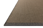 Neutral striped rug with subtle texture and dark border detail