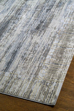 Modern striped area rug in grey, blue and cream with textured woven pattern