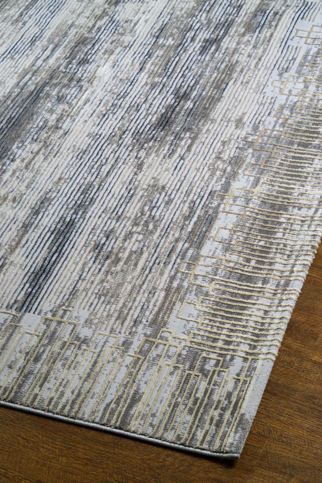 Modern striped area rug in grey, blue and cream with textured woven pattern