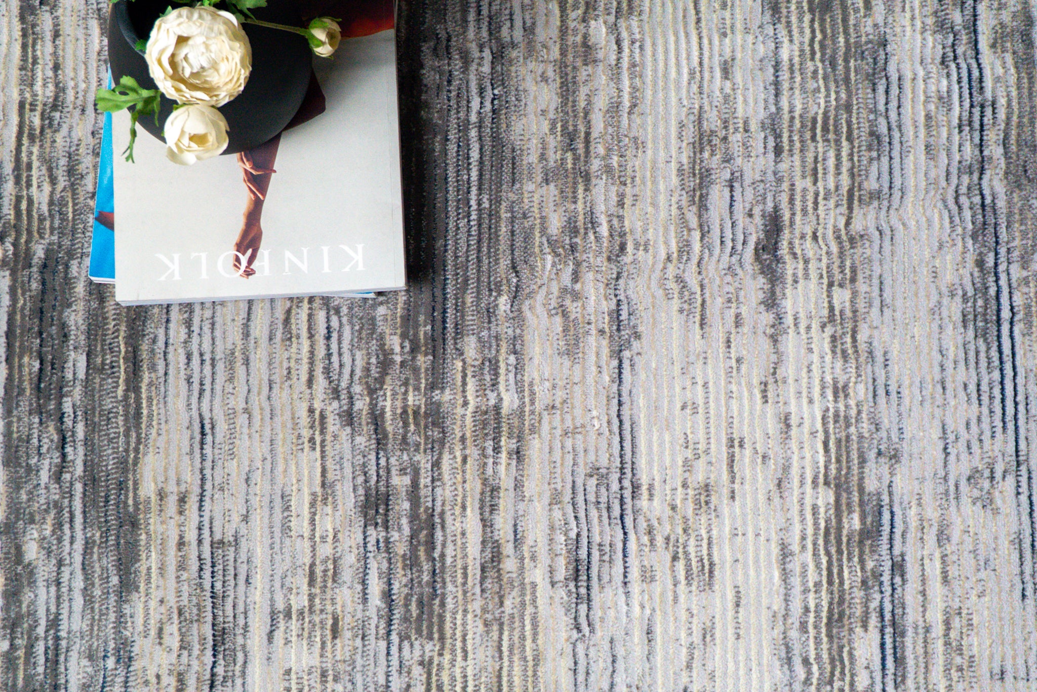 Modern striped area rug in grey, blue and cream with textured woven pattern