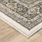 Traditional ornate rug with cream and brown geometric floral border pattern
