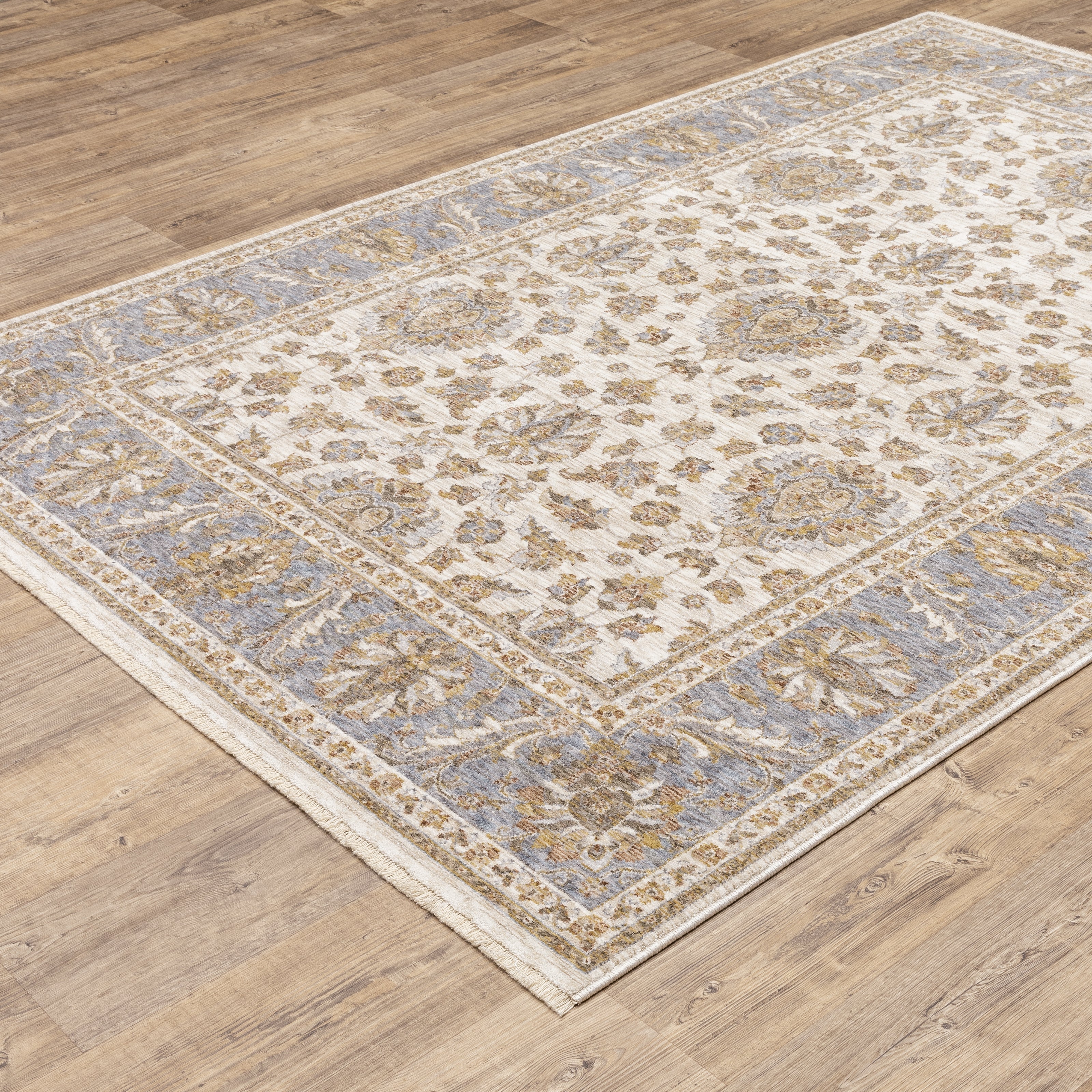Cream and blue traditional floral area rug with ornate damask border design