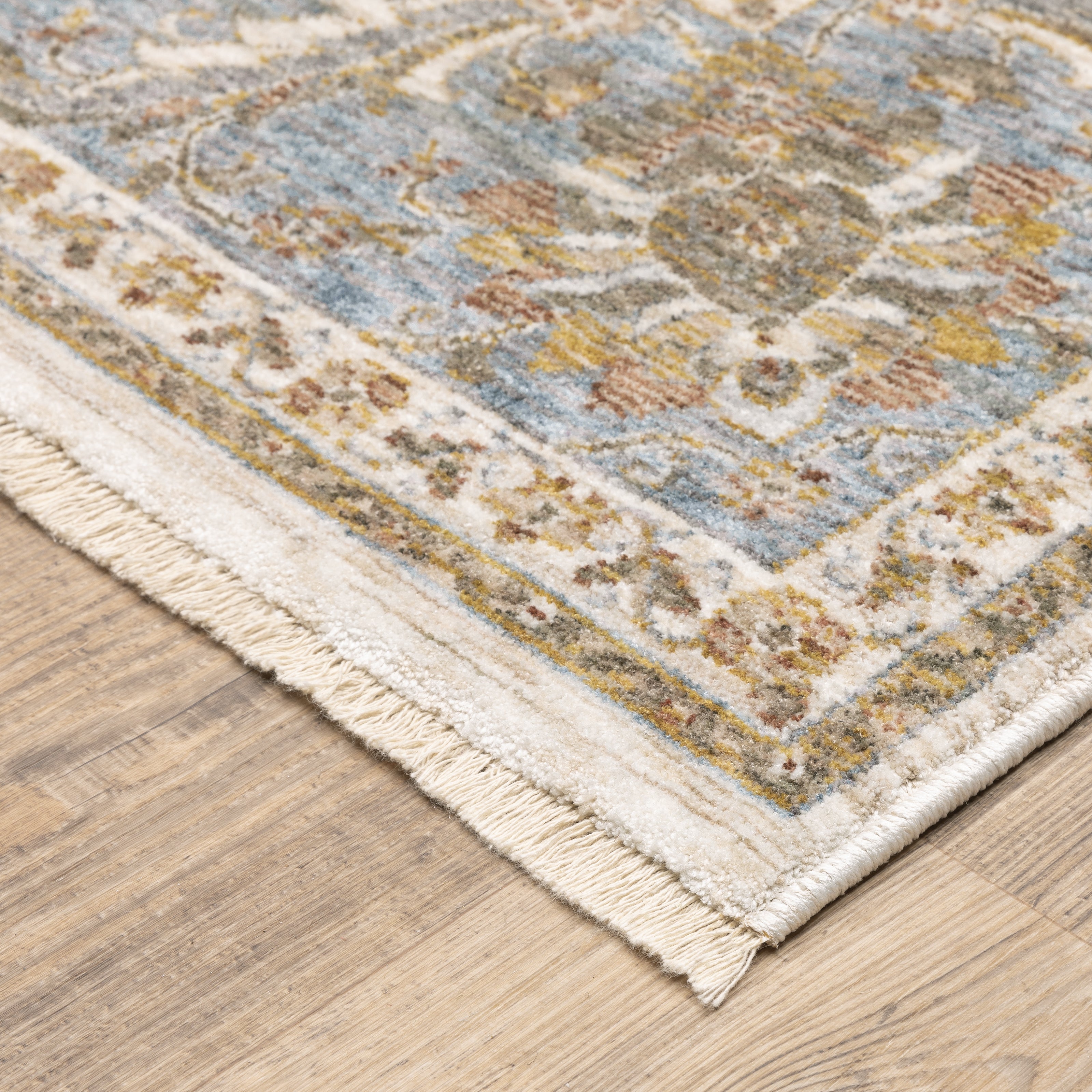 Cream and blue traditional floral area rug with ornate damask border design