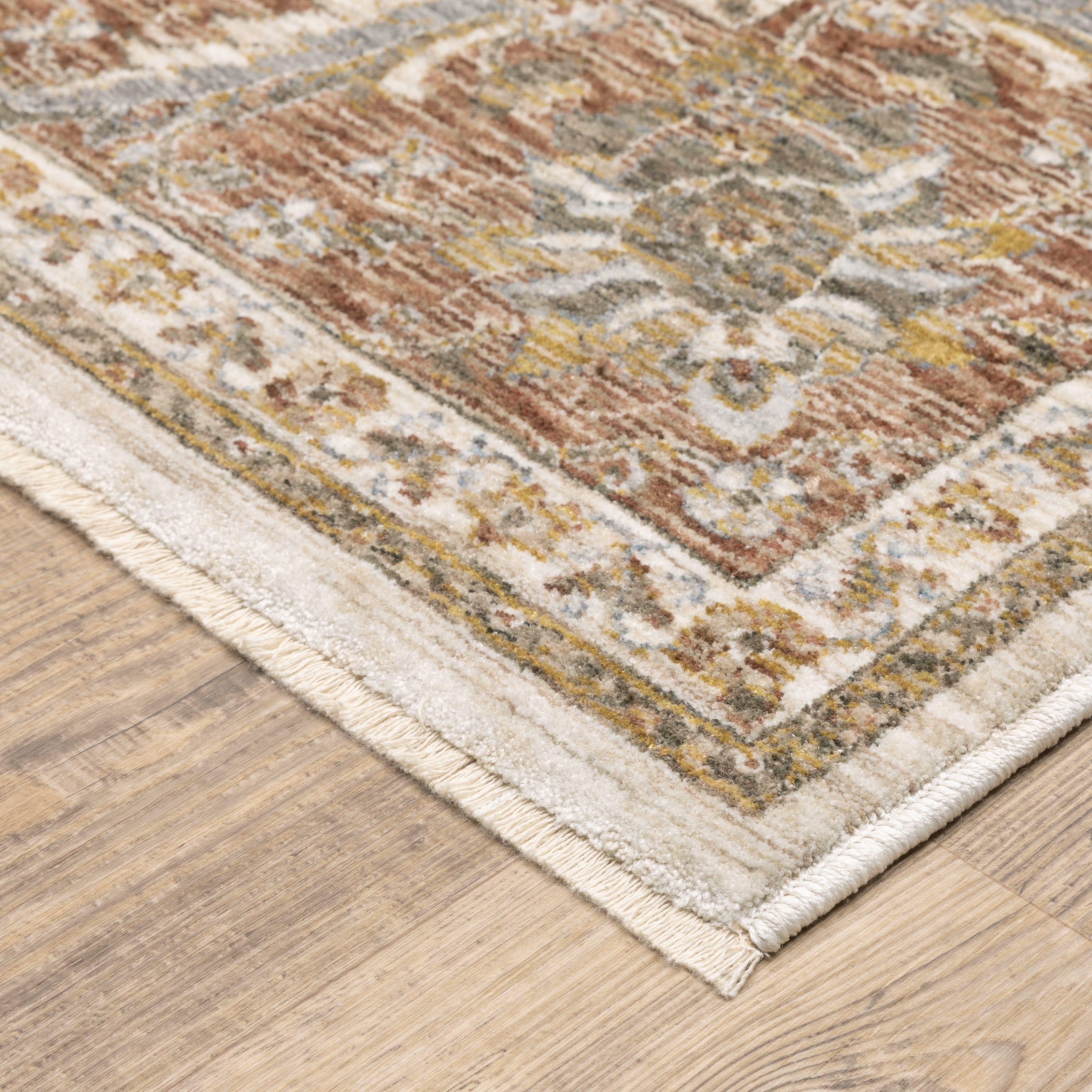 Classic floral pattern rug with cream center, terracotta border and ornate medallion design
