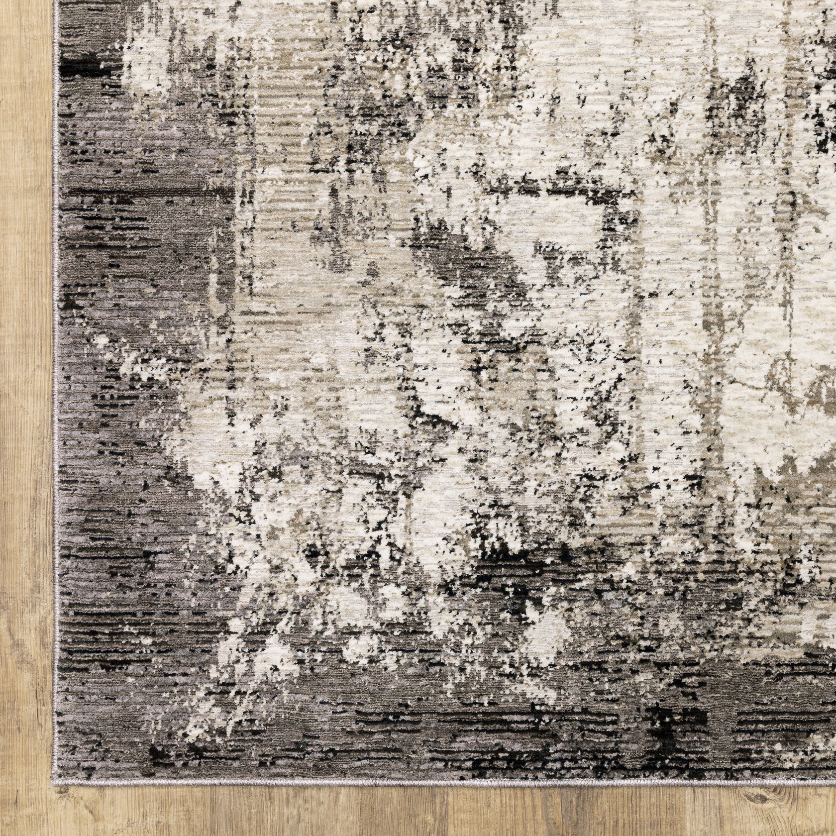 Vintage distressed grey and cream rug with abstract mottled texture pattern