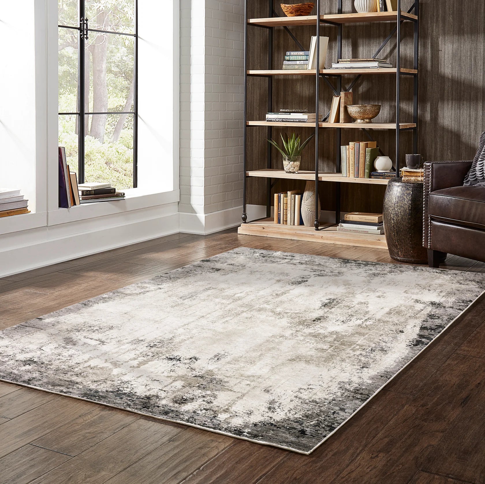 Vintage distressed grey and cream rug with abstract mottled texture pattern