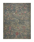 Vintage-style rug with blue-gray base and faded floral pattern in cream and red tones