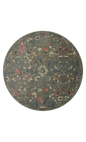 Vintage-style rug with blue-gray base and faded floral pattern in cream and red tones