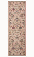 Blush pink traditional rug with intricate floral motifs and ornate border design