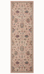 Blush pink traditional rug with intricate floral motifs and ornate border design