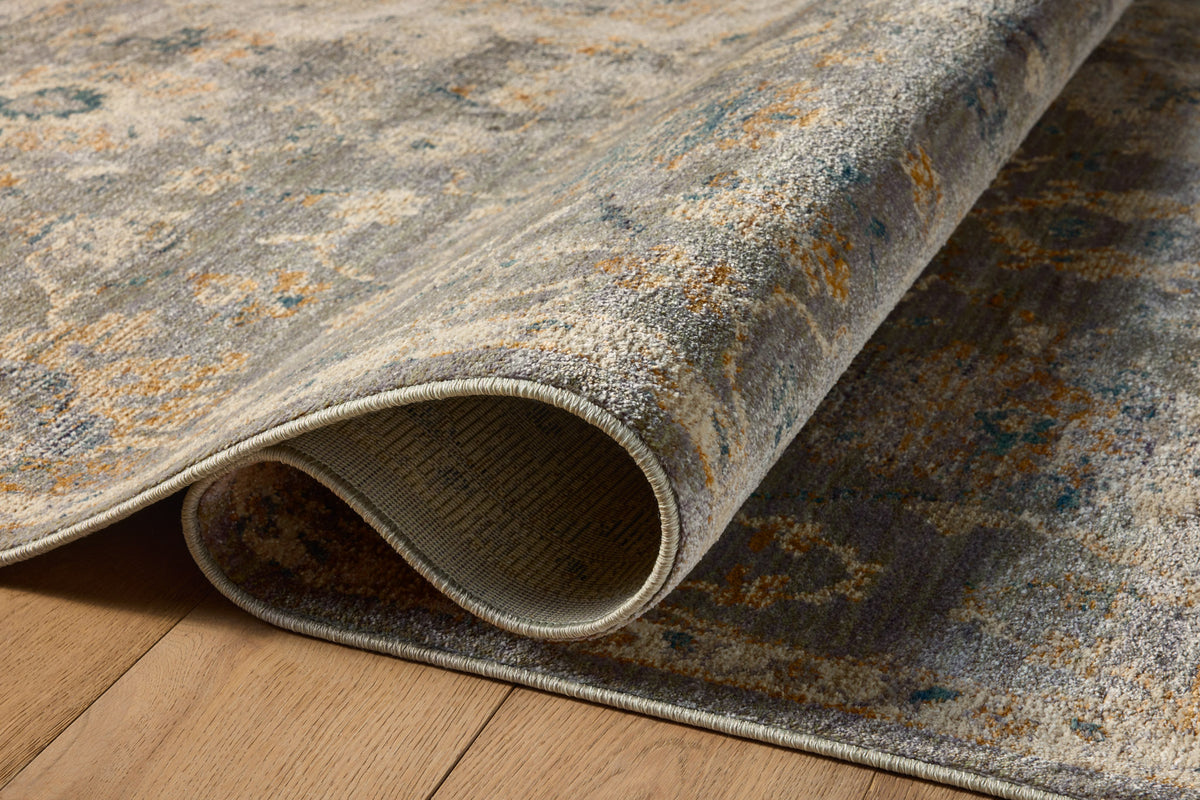 Gray traditional rug with floral botanical pattern and cream border