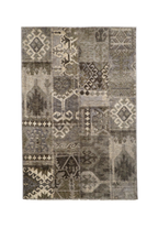 Vintage patchwork rug with geometric patterns in gray and cream tones