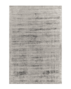 Contemporary grey textured area rug with subtle distressed pattern throughout