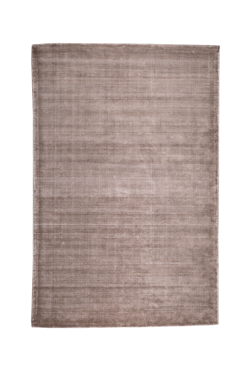 Soft taupe velvet rug with subtle texture and minimalist design
