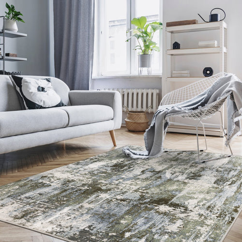 Abstract distressed rug with blue, grey and white textured pattern