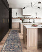 Dark blue traditional rug with ornate floral damask pattern in cream and rose tones