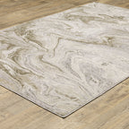 Beige and taupe marbled swirl pattern area rug with textured finish