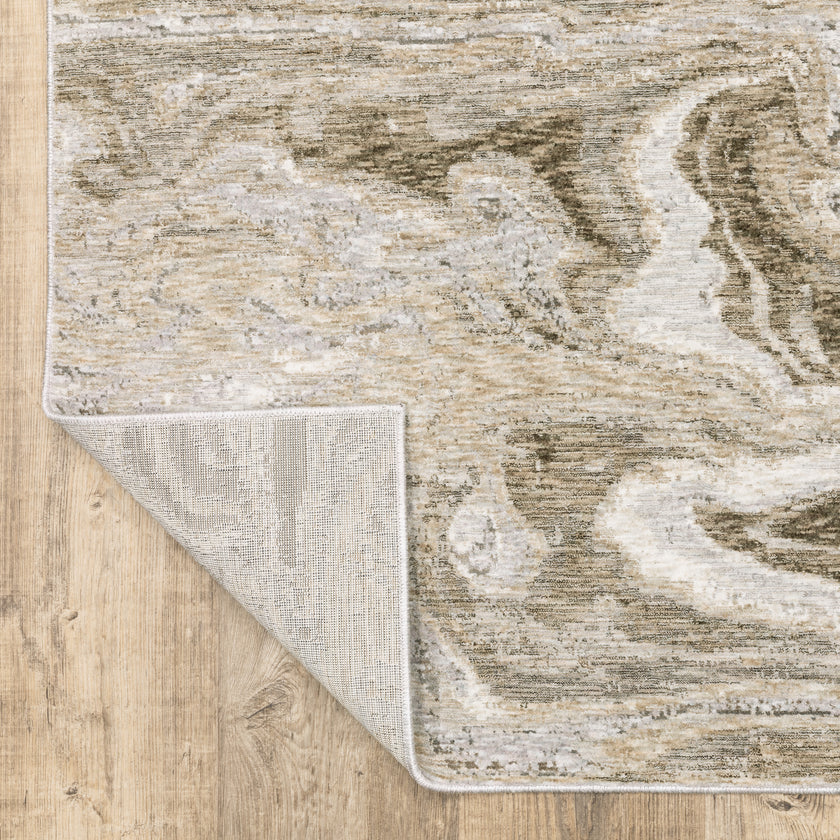 Beige and taupe marbled swirl pattern area rug with textured finish