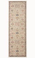 Vintage-style area rug with cream base, intricate geometric and floral patterns in rust and blue tones